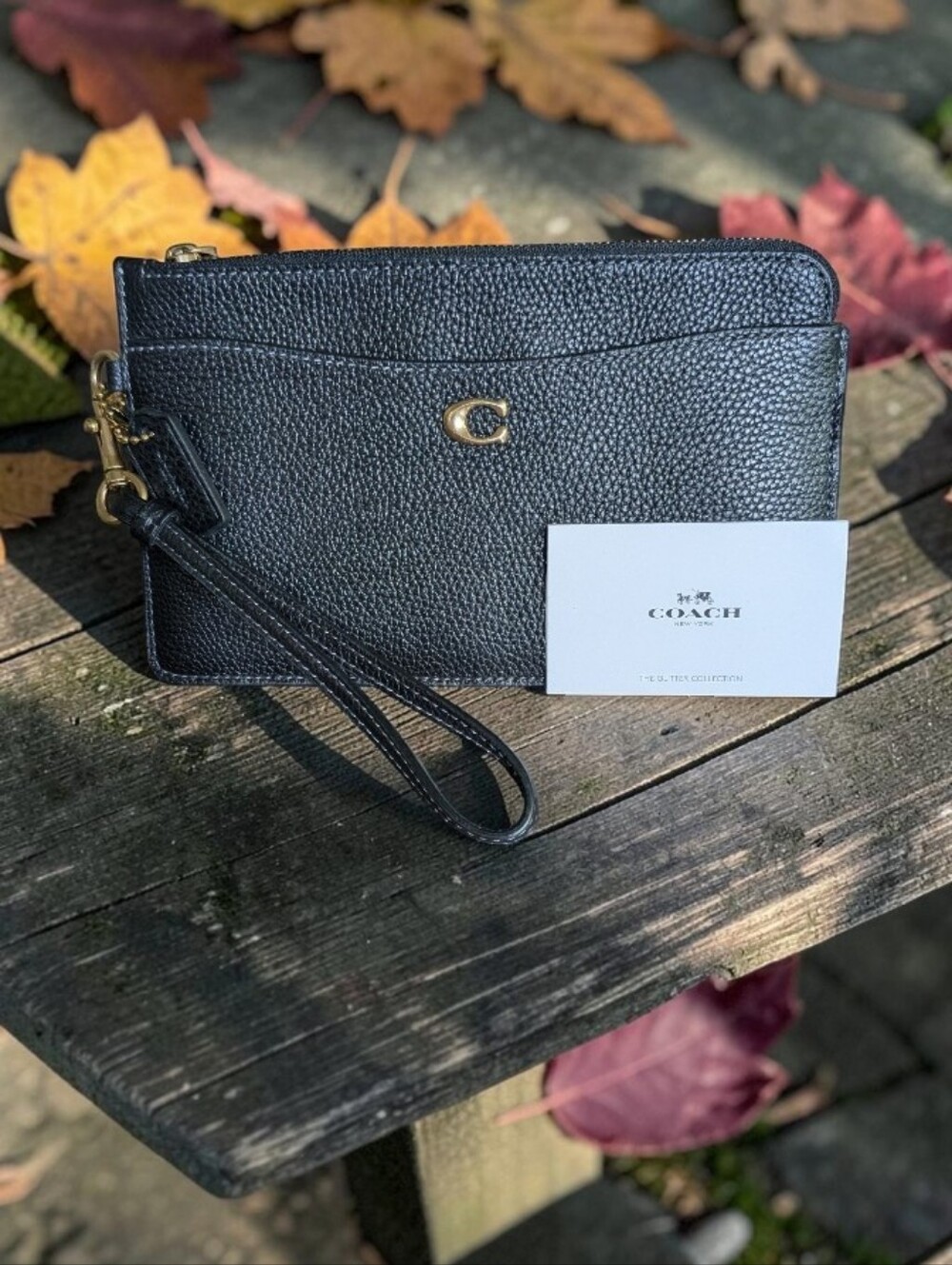 NWT Coach Black Pebbled Leather Wristlet with Gold 'C' Accent
